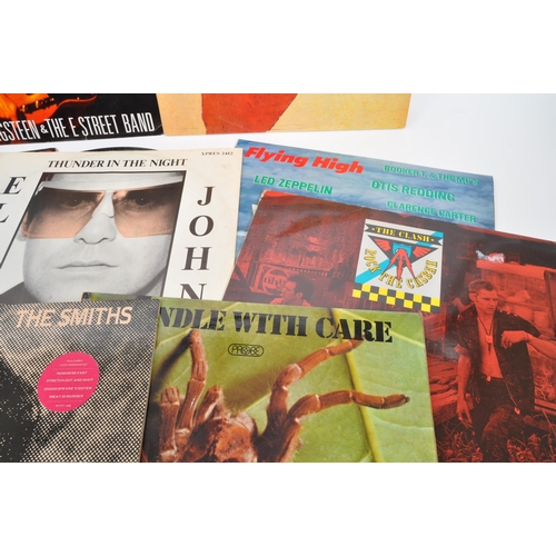 417 - A collection of late 20th century vinyl rock LP records. The collection to include Sandista - The Cl... 