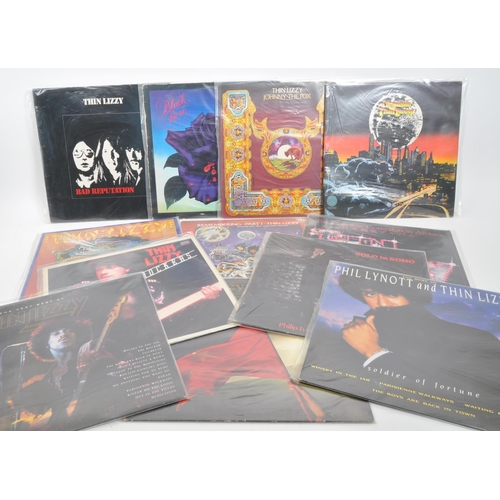 419 - Thin Lizzy - A collection of 20th century Thin Lizzy hard rock vinyl LP records. The collection to i... 