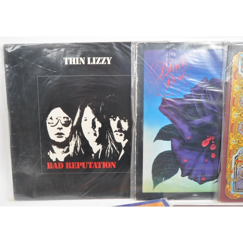 419 - Thin Lizzy - A collection of 20th century Thin Lizzy hard rock vinyl LP records. The collection to i... 