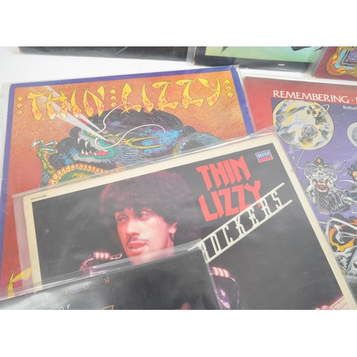 419 - Thin Lizzy - A collection of 20th century Thin Lizzy hard rock vinyl LP records. The collection to i... 