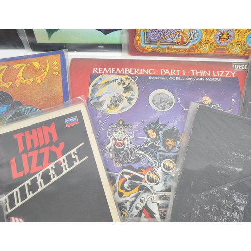 419 - Thin Lizzy - A collection of 20th century Thin Lizzy hard rock vinyl LP records. The collection to i... 