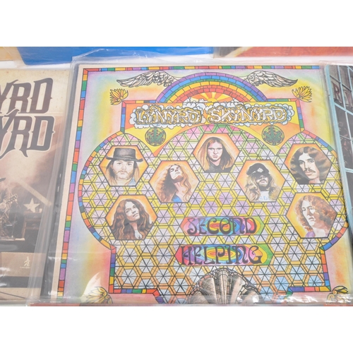 423 - Lynyrd Skynyrd - A collection of 20th century Lynyrd Skynyrd southern rock vinyl LP records. The col... 