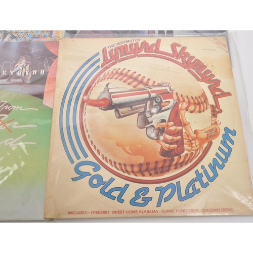 423 - Lynyrd Skynyrd - A collection of 20th century Lynyrd Skynyrd southern rock vinyl LP records. The col... 