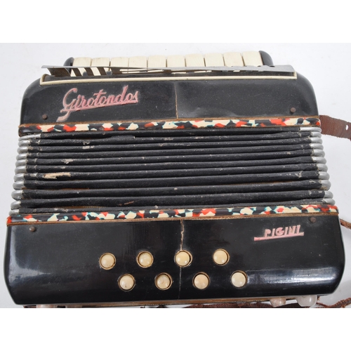 424 - Girotondo Pigini - A 20th Century small vintage Girotondo Pigini accordion. Measuring approximately ... 