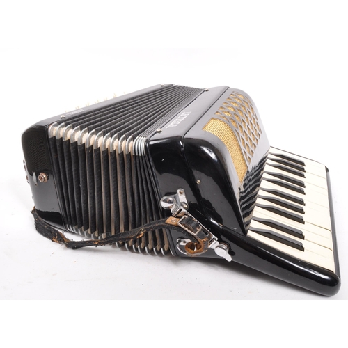 425 - La Tosca - A 20th century La Tosca Primo piano accordion. The accordion having a black body, with go... 