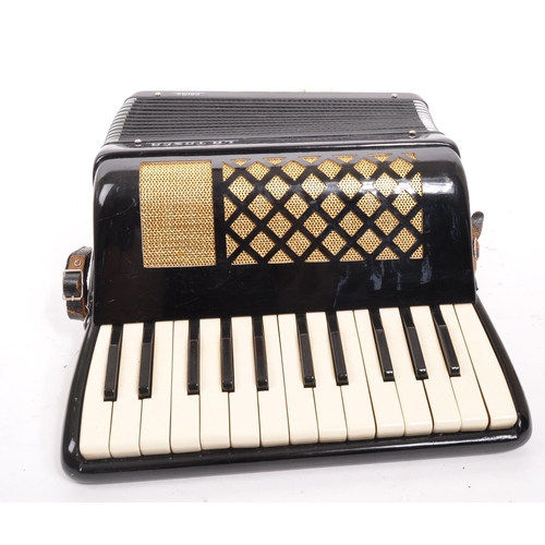 425 - La Tosca - A 20th century La Tosca Primo piano accordion. The accordion having a black body, with go... 