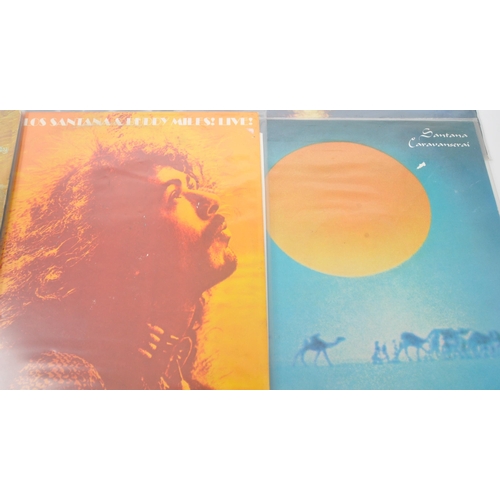 435 - Carlos Santana - A collection of 20th century Santana pop rock vinyl LP records. The collection to i... 