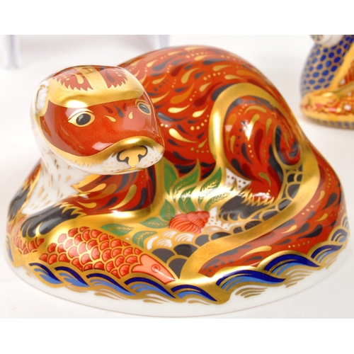 46 - Royal Crown Derby - A collection of four porcelain china Royal Crown Derby paperweight animal figure... 