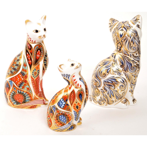 47 - Royal Crown Derby - A collection of three porcelain china Royal Crown Derby paperweight cat figures ... 