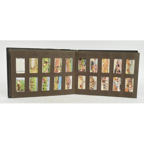 541 - A collection of 20th Century cigarette cards held within album. To include Gilbert and Sullivan issu... 