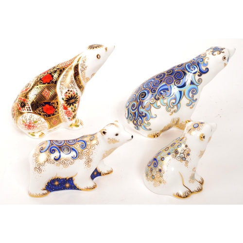 69 - Royal Crown Derby - A collection of four porcelain china Royal Crown Derby paperweight figures in th... 