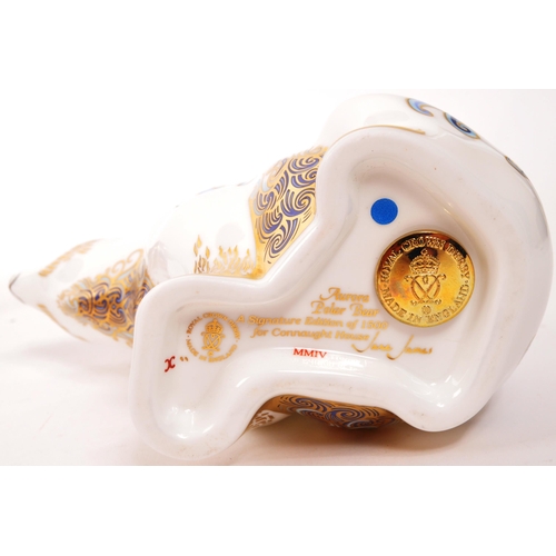 69 - Royal Crown Derby - A collection of four porcelain china Royal Crown Derby paperweight figures in th... 