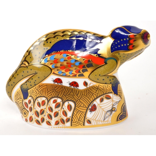 71 - Royal Crown Derby - A porcelain china Royal Crown Derby paperweight figure ' Chameleon ' designed by... 