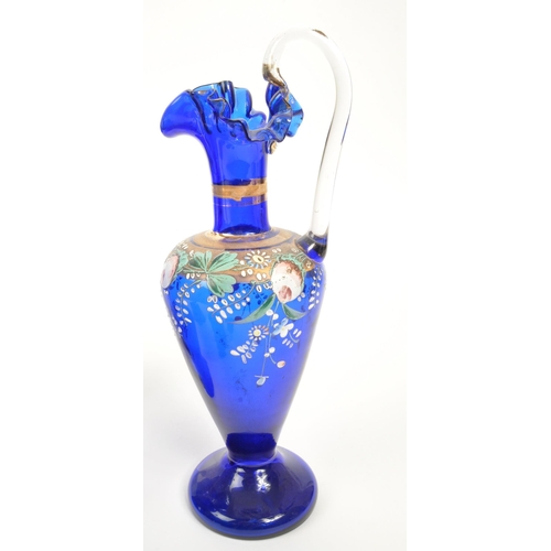 78 - A collection of 19th and 20th century Bristol blue glass pieces. The collection to include a pair of... 