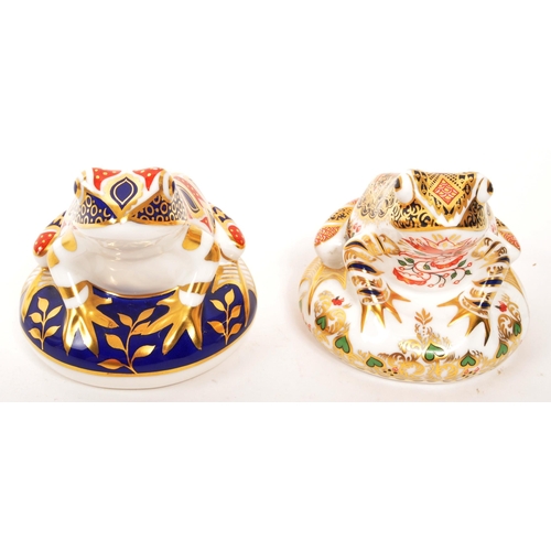 79 - Royal Crown Derby - A pair of porcelain china Royal Crown Derby paperweight figures in the form of f... 