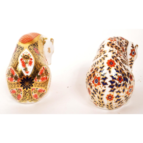 81 - Royal Crown Derby - Two porcelain china Royal Crown Derby paperweight figures in the form of bears. ... 