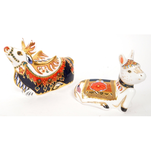 85 - Royal Crown Derby - Two porcelain china Royal Crown Derby paperweight figures. Comprising of imari '... 