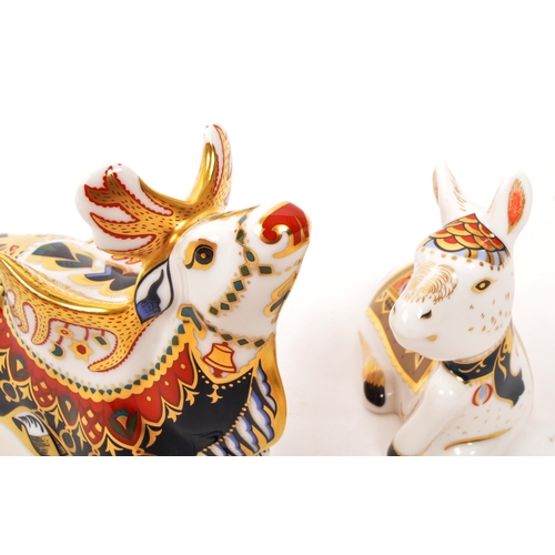 85 - Royal Crown Derby - Two porcelain china Royal Crown Derby paperweight figures. Comprising of imari '... 