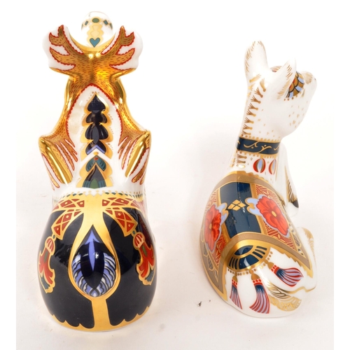 85 - Royal Crown Derby - Two porcelain china Royal Crown Derby paperweight figures. Comprising of imari '... 