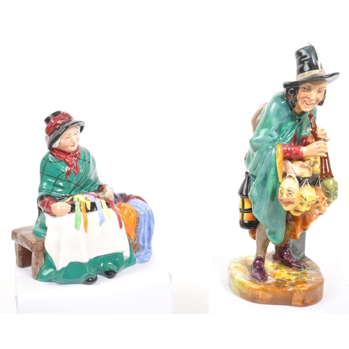 87 - Royal Doulton - Two porcelain china Royal Doulton figurines comprising of The Mask Seller HN2103 and... 