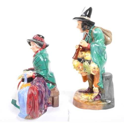 87 - Royal Doulton - Two porcelain china Royal Doulton figurines comprising of The Mask Seller HN2103 and... 