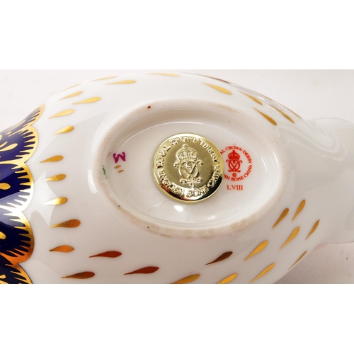 89 - Royal Crown Derby - Two porcelain china Royal Crown Derby paperweight figures in the form of owls. C... 