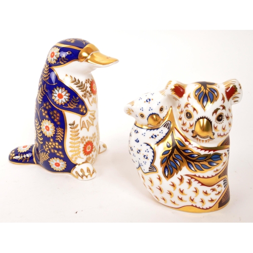 90 - Royal Crown Derby - Two porcelain china Royal Crown Derby paperweight animal figures. Comprising of ... 