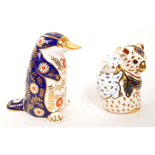 90 - Royal Crown Derby - Two porcelain china Royal Crown Derby paperweight animal figures. Comprising of ... 