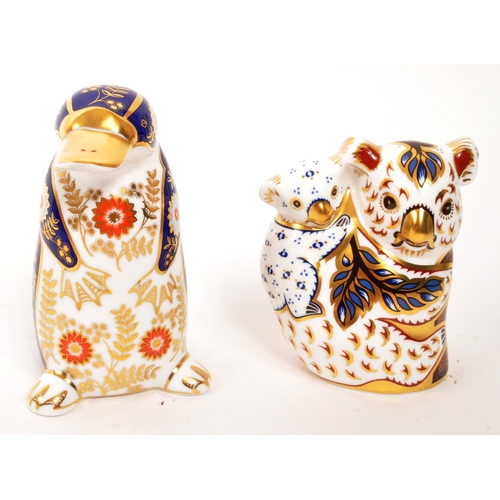 90 - Royal Crown Derby - Two porcelain china Royal Crown Derby paperweight animal figures. Comprising of ... 