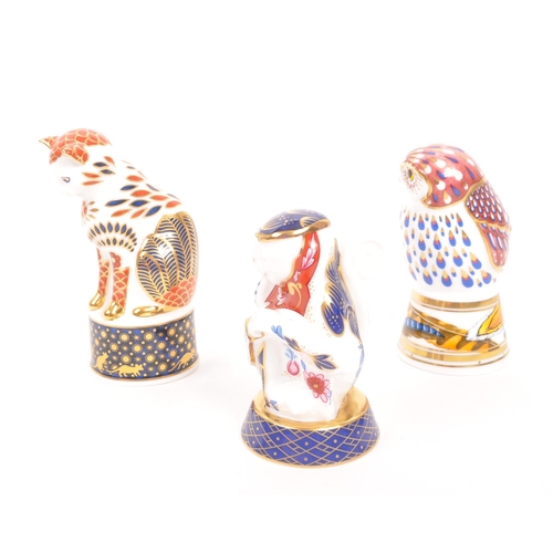 94 - Royal Worcester - A collection of three porcelain china Royal Worcester candle snuffers from the Con... 