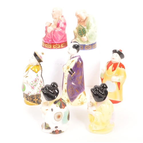 95 - Royal Worcester - A collection of seven porcelain china Royal Worcester candle snuffers. Comprising ... 