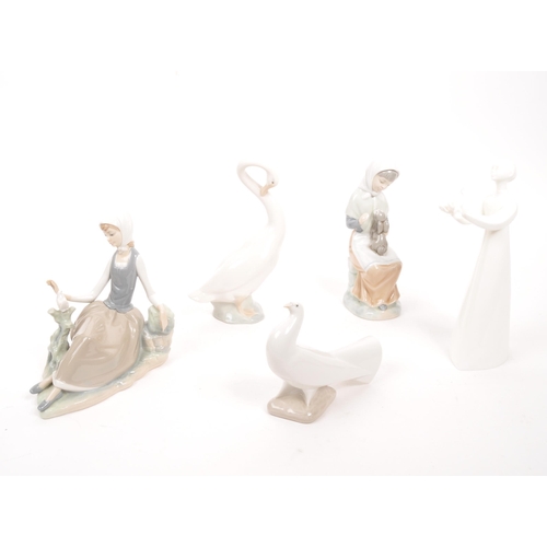 97 - Nao for Lladro / Royal Doulton - A collection of five porcelain china figurines comprising of four N... 