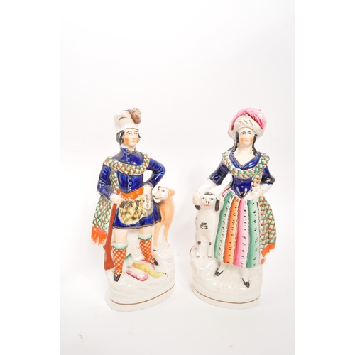 101 - Staffordshire - A pair of 19th Century ceramic Staffordshire figurines comprising of a male figure w... 