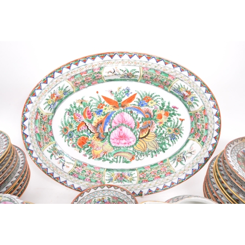 106 - A 20th Century famille rose Chinese porcelain dinner and tea service. Comprising of dinner plates, l... 