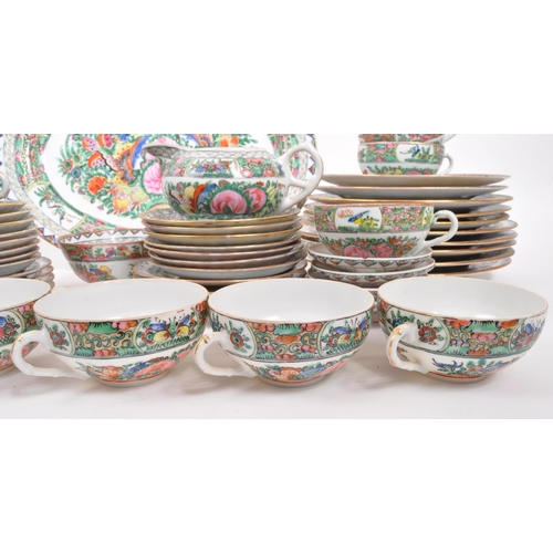 106 - A 20th Century famille rose Chinese porcelain dinner and tea service. Comprising of dinner plates, l... 