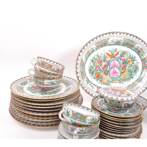 106 - A 20th Century famille rose Chinese porcelain dinner and tea service. Comprising of dinner plates, l... 