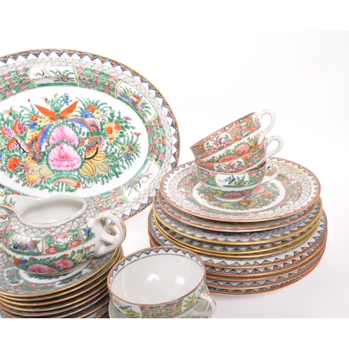 106 - A 20th Century famille rose Chinese porcelain dinner and tea service. Comprising of dinner plates, l... 