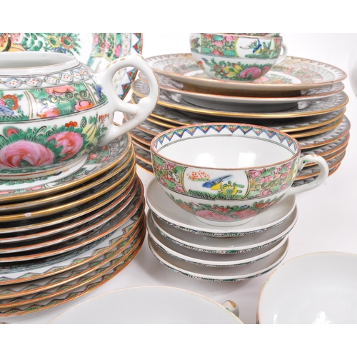 106 - A 20th Century famille rose Chinese porcelain dinner and tea service. Comprising of dinner plates, l... 