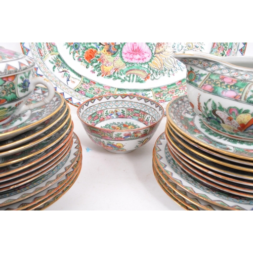 106 - A 20th Century famille rose Chinese porcelain dinner and tea service. Comprising of dinner plates, l... 