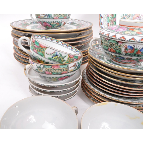 106 - A 20th Century famille rose Chinese porcelain dinner and tea service. Comprising of dinner plates, l... 