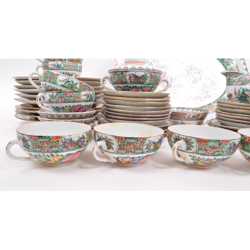 106 - A 20th Century famille rose Chinese porcelain dinner and tea service. Comprising of dinner plates, l... 