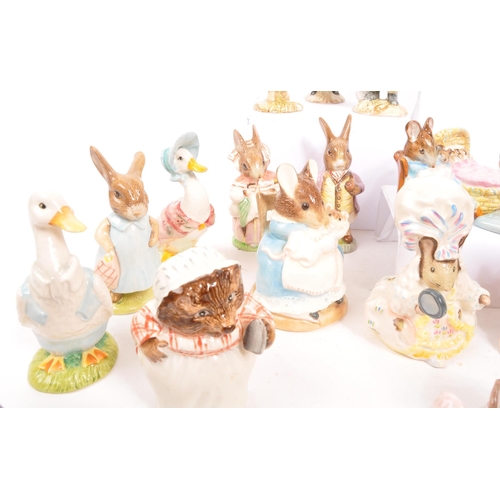 11 - Beatrix Potter - Beswick - A large collection of mid century and later Beswick Peter Rabbit porcelai... 