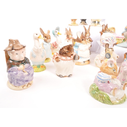 11 - Beatrix Potter - Beswick - A large collection of mid century and later Beswick Peter Rabbit porcelai... 