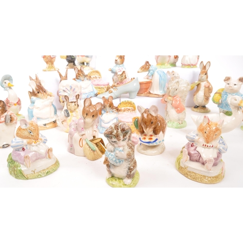 11 - Beatrix Potter - Beswick - A large collection of mid century and later Beswick Peter Rabbit porcelai... 