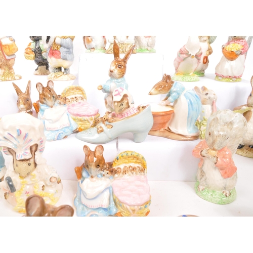 11 - Beatrix Potter - Beswick - A large collection of mid century and later Beswick Peter Rabbit porcelai... 