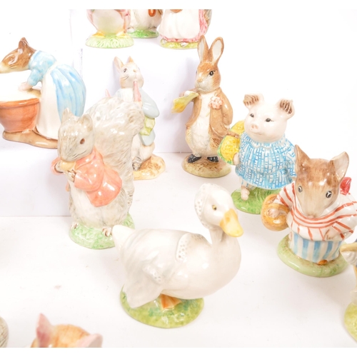 11 - Beatrix Potter - Beswick - A large collection of mid century and later Beswick Peter Rabbit porcelai... 