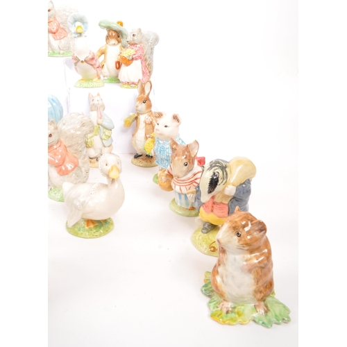 11 - Beatrix Potter - Beswick - A large collection of mid century and later Beswick Peter Rabbit porcelai... 