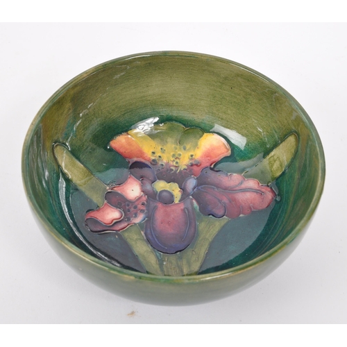 113 - Moorcroft - Early 20th century ceramic pottery Orchid dish / bowl. Green and blue ground with W Moor... 