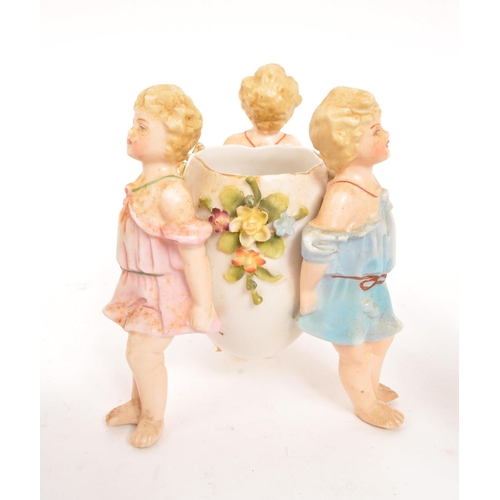 122 - Dresden / Sitzendorf - Two porcelain Dresden female figures one wearing hat with basket of flowers i... 