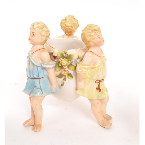 122 - Dresden / Sitzendorf - Two porcelain Dresden female figures one wearing hat with basket of flowers i... 